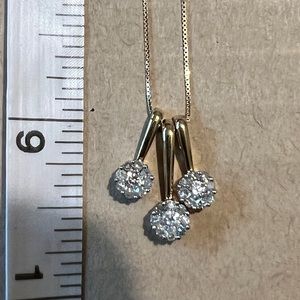 10kt yellow gold and diamond necklace with chain. New never worn.